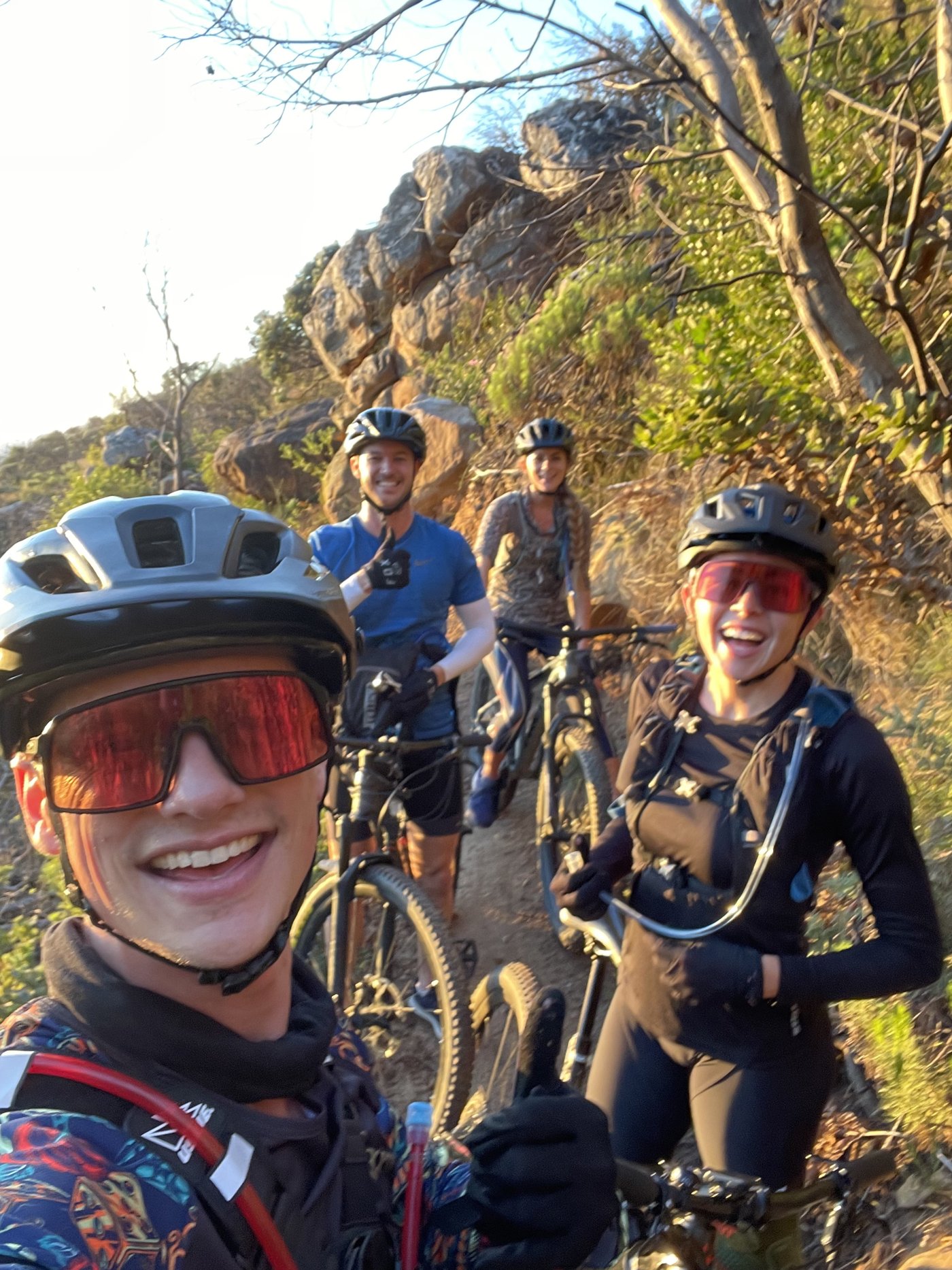 Riders on singletrack below Table Mountain