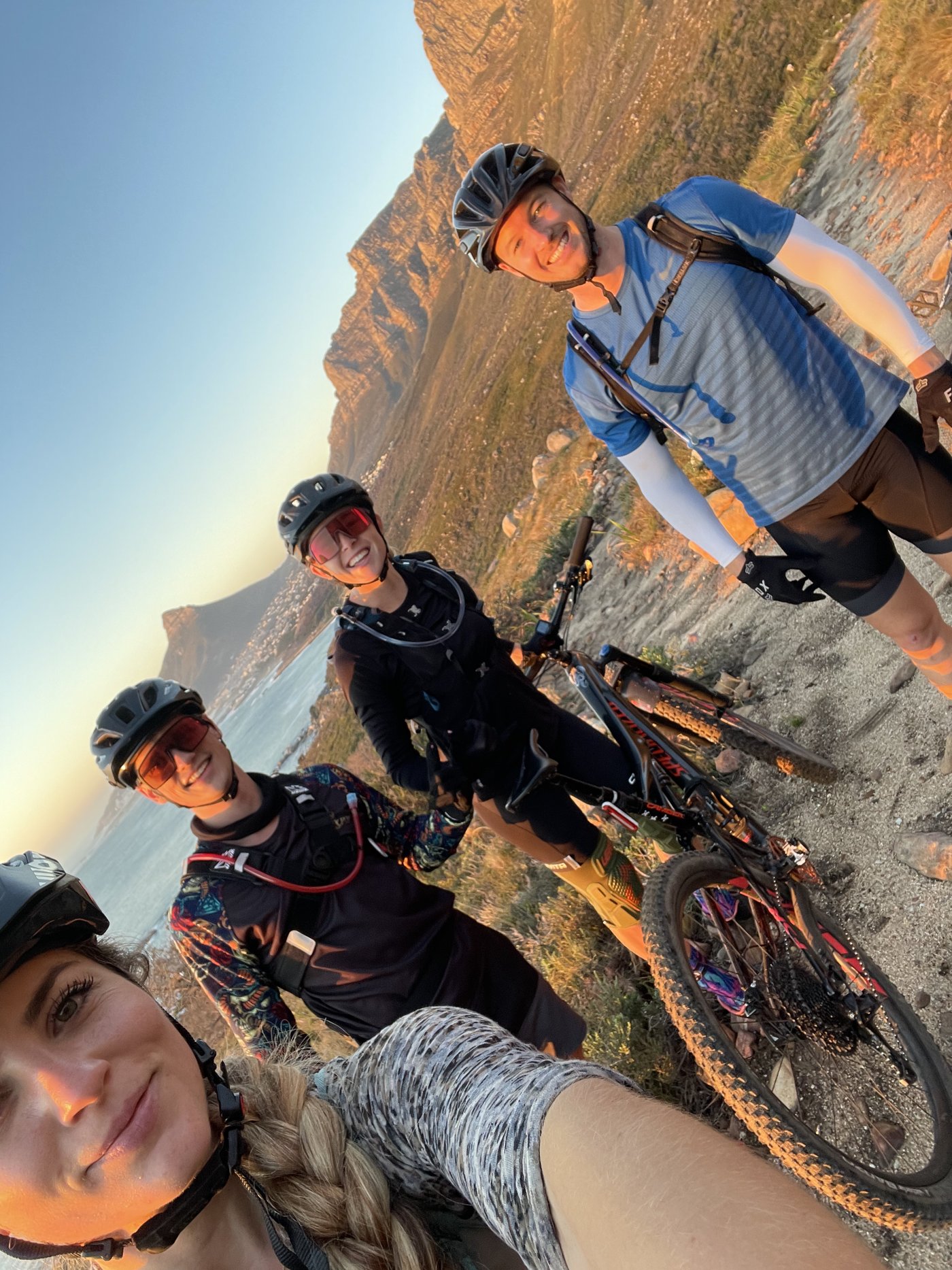 Riders on a ridge above the Twelve Apostles